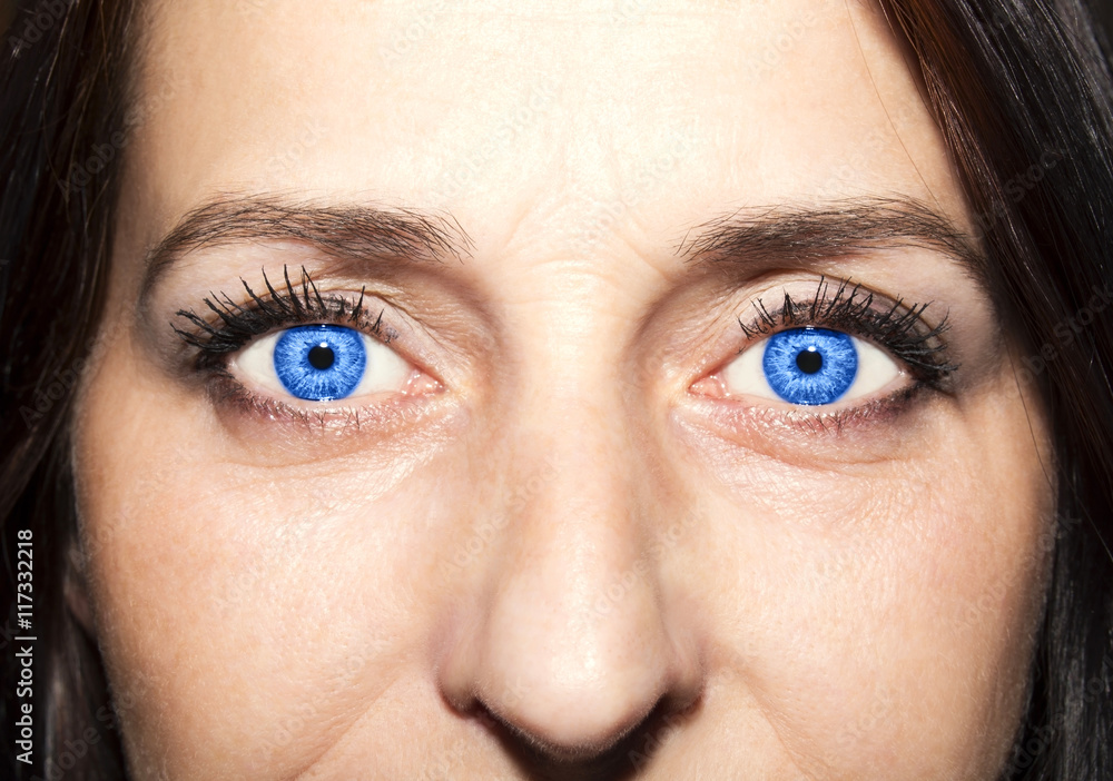 Fototapeta premium Beautiful insightful look blue woman's eyes