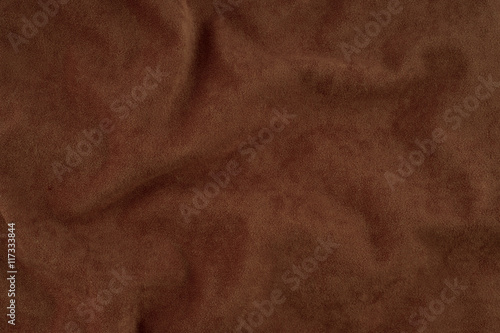 Brown wrinkled fabric texture.