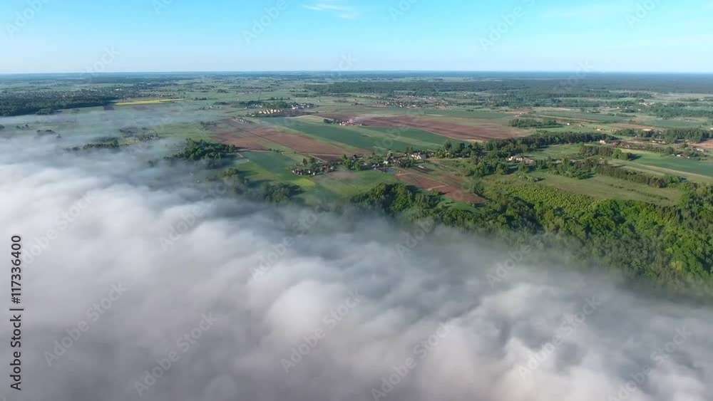 flying above landcape with mist flying above landcape with mist