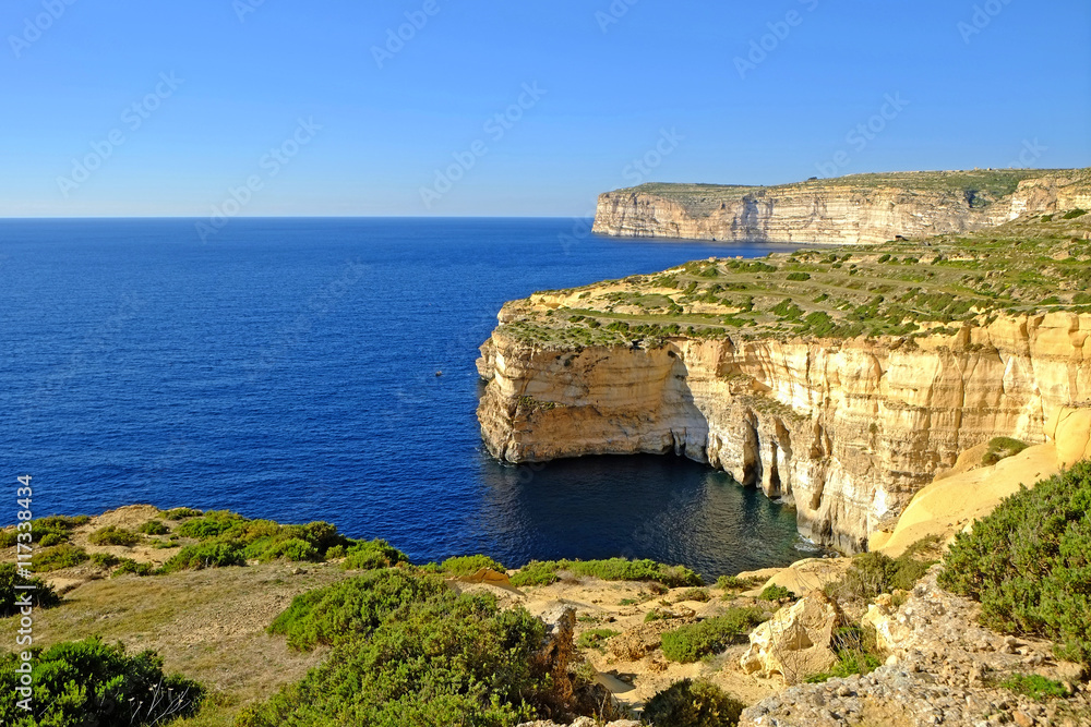 The sandstone cliffs at Xlendi on the Island of Gozo, Malta.