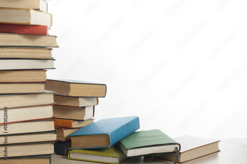 Stack of books isolated on white background. Education concept. Back to school. Stack of books isolated on white background. Education concept. Back to school.