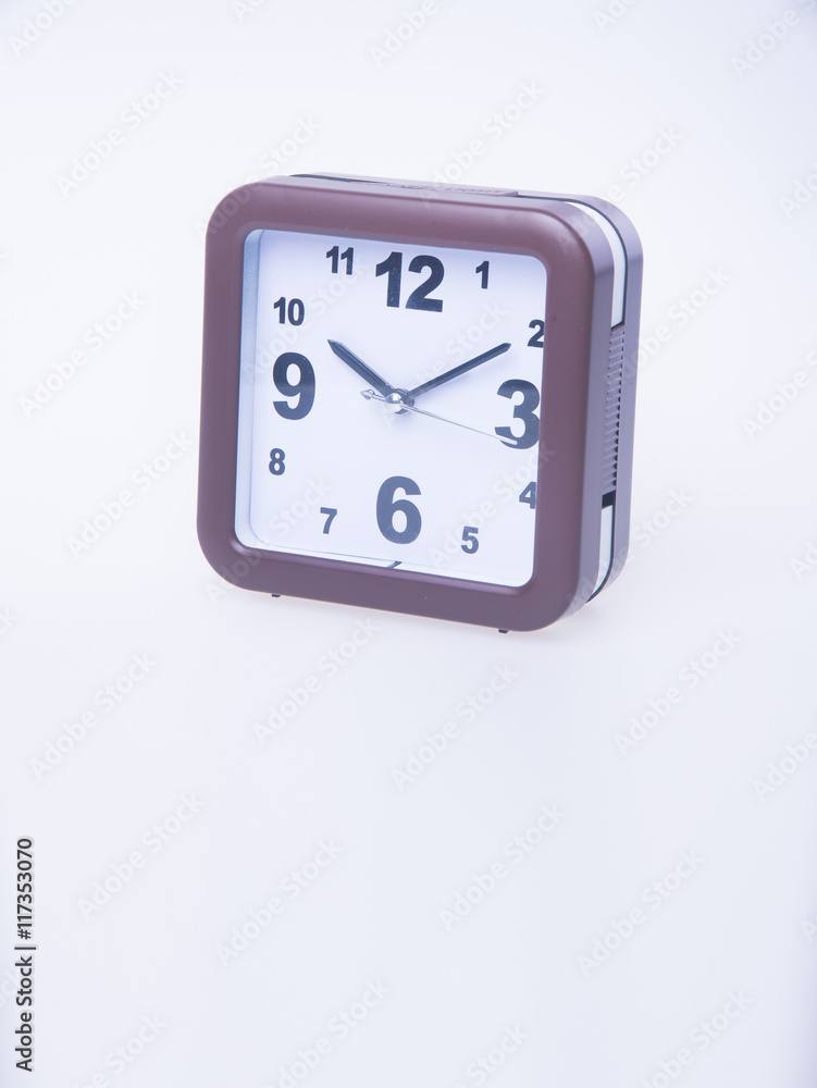 alarm clock. alarm clock on background. alarm clock on the backg alarm clock. alarm clock on background. alarm clock on the backg