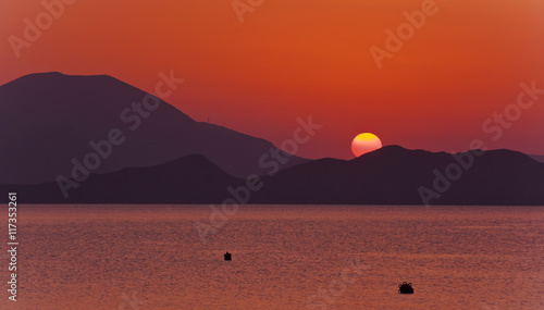 The sun rises over the mountains and the sea Bay.Crimea.