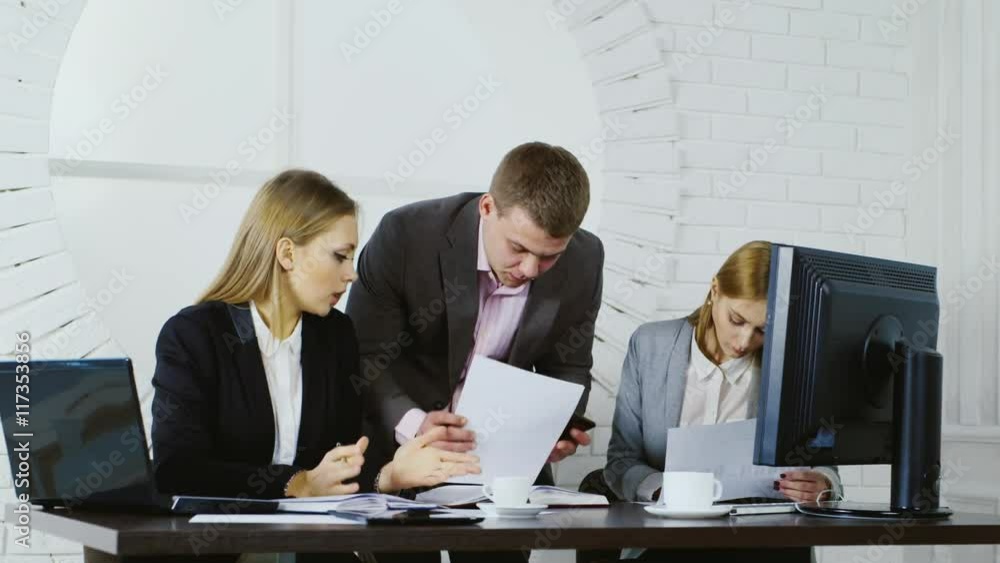 Young successful people working together in the office Young successful people working together in the office