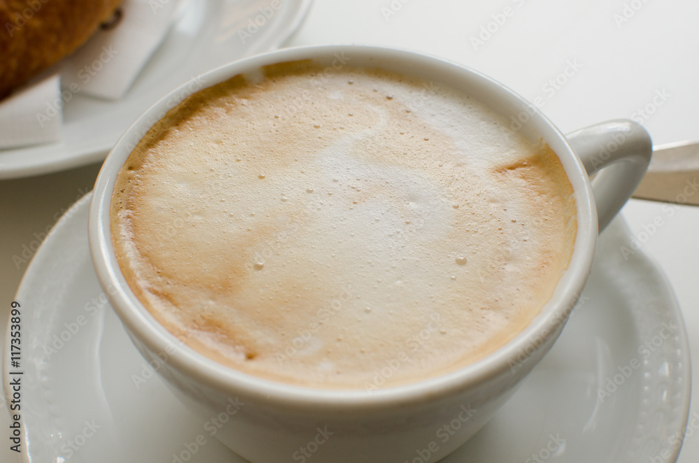 The cup of cappuccino with foam The cup of cappuccino with foam