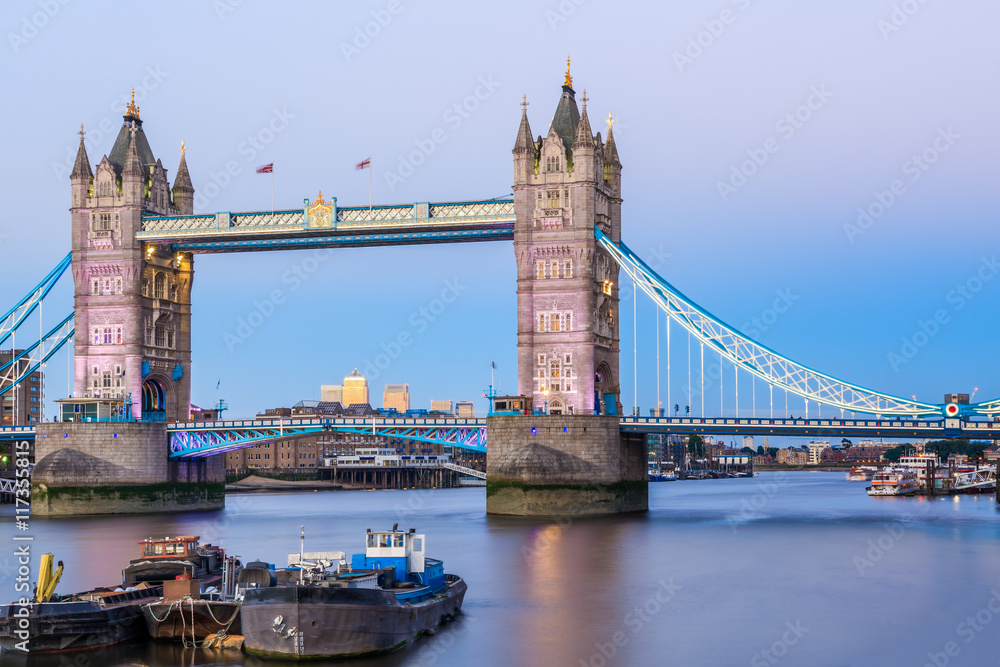 Tower Bridge in London at sunset with a light blue sky