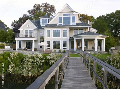 Exterior view of a house from a wooden footbridge