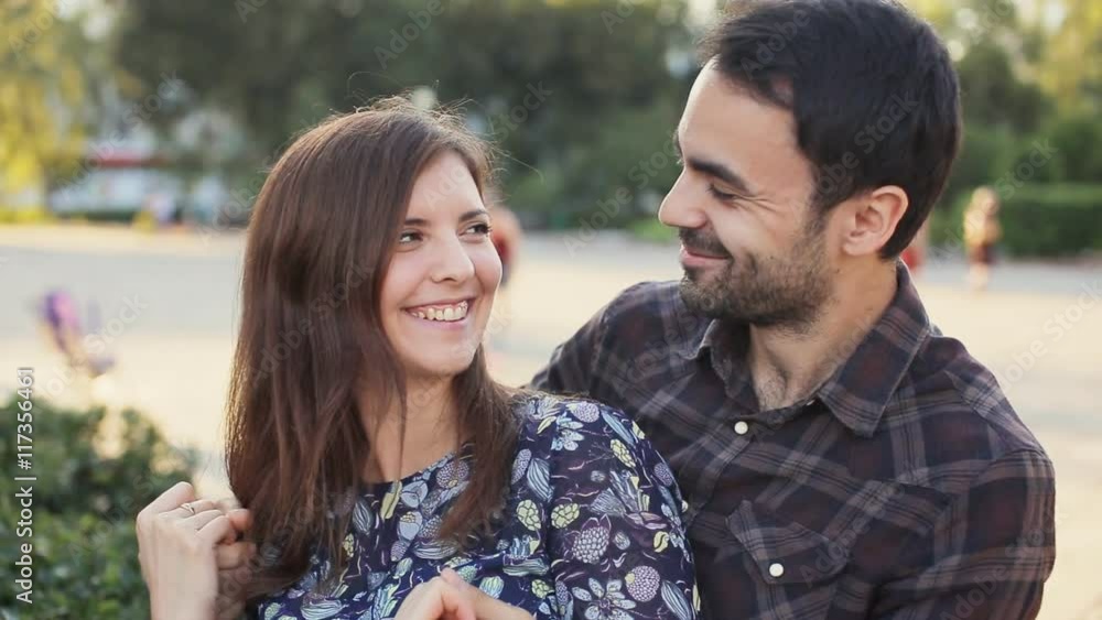 man covering the eyes of surprised girlfriend man covering the eyes of surprised girlfriend