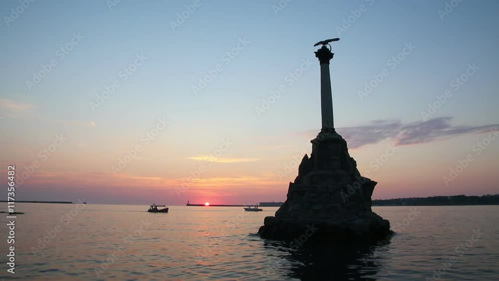 The Sevastopol Bay and the monument to the scuttled ships at sunset, Crimea, Russia The Sevastopol Bay and the monument to the scuttled ships at sunset, Crimea, Russia
