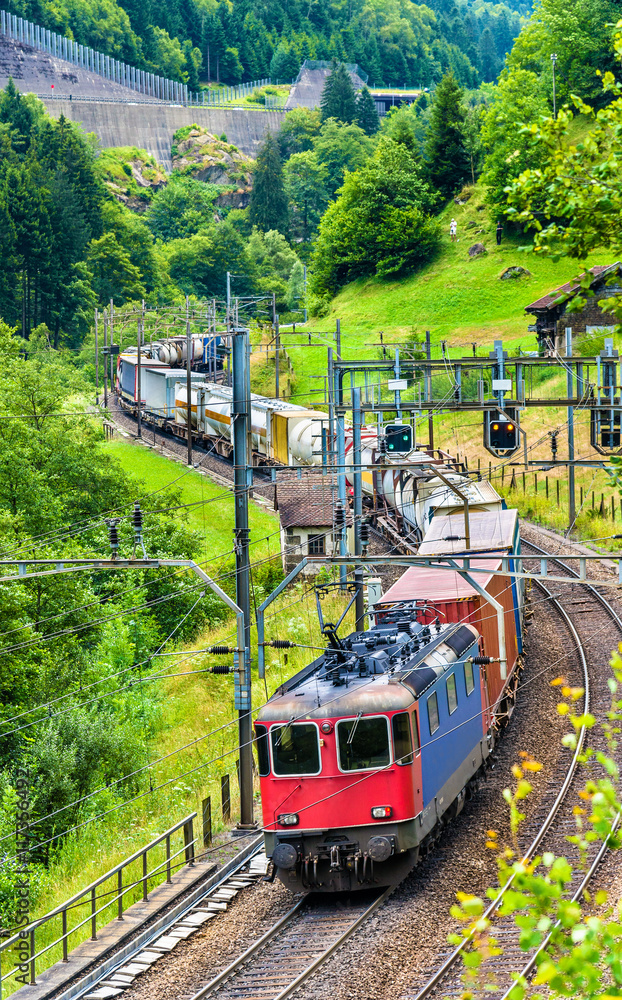 Obraz premium Freight train climbs up the Gotthard railway - Switzerland