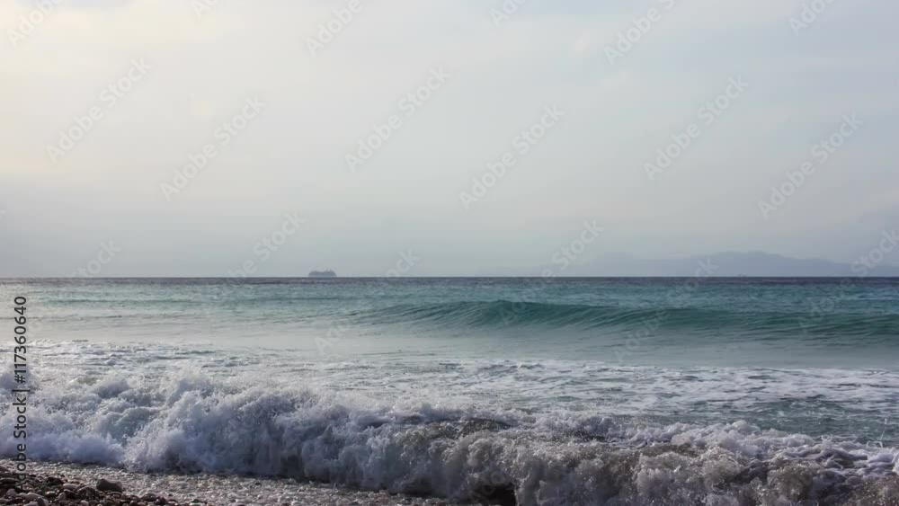 beautiful resort beach with stone pebbles in Rhodes island, Greece. Aegean seashore timelapse 4K beautiful resort beach with stone pebbles in Rhodes island, Greece. Aegean seashore timelapse 4K