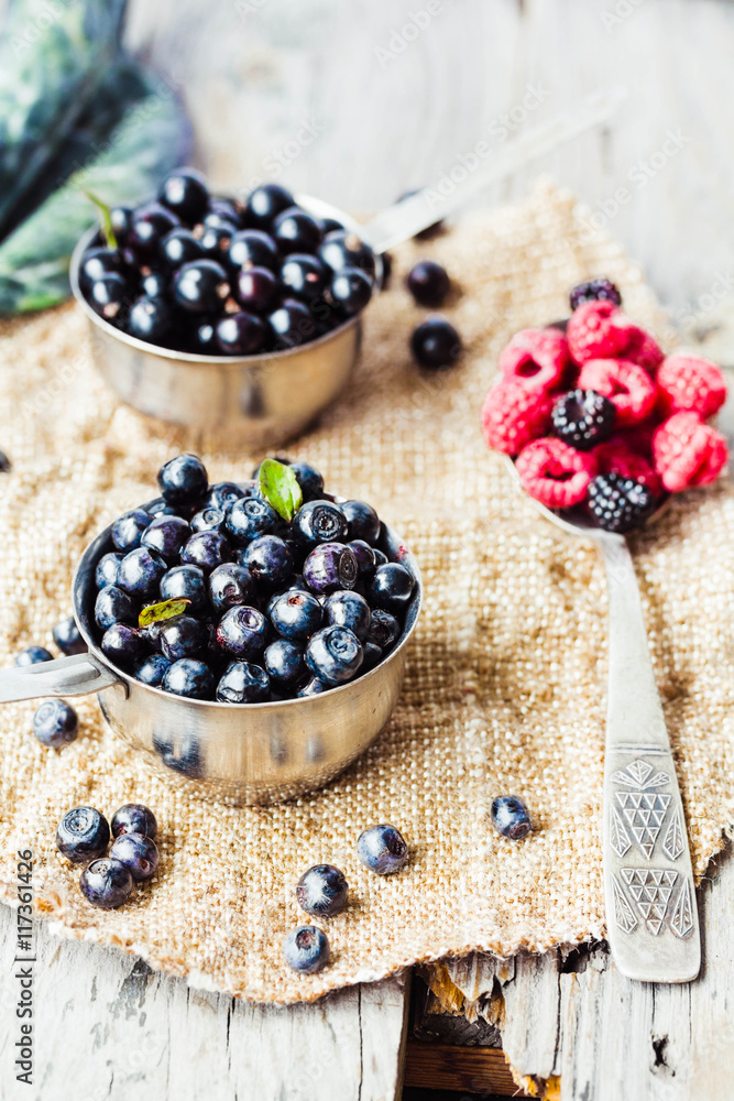 fresh blueberries, currants and raspberries,selective focus, rus fresh blueberries, currants and raspberries,selective focus, rus
