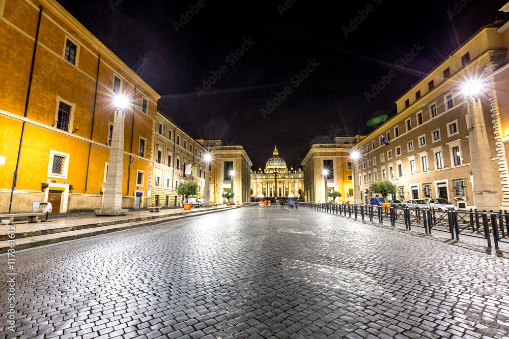 Fototapeta premium The Conciliazione Road to St. Peter square for from Pia square at night. Vatican City in Rome, Ital
