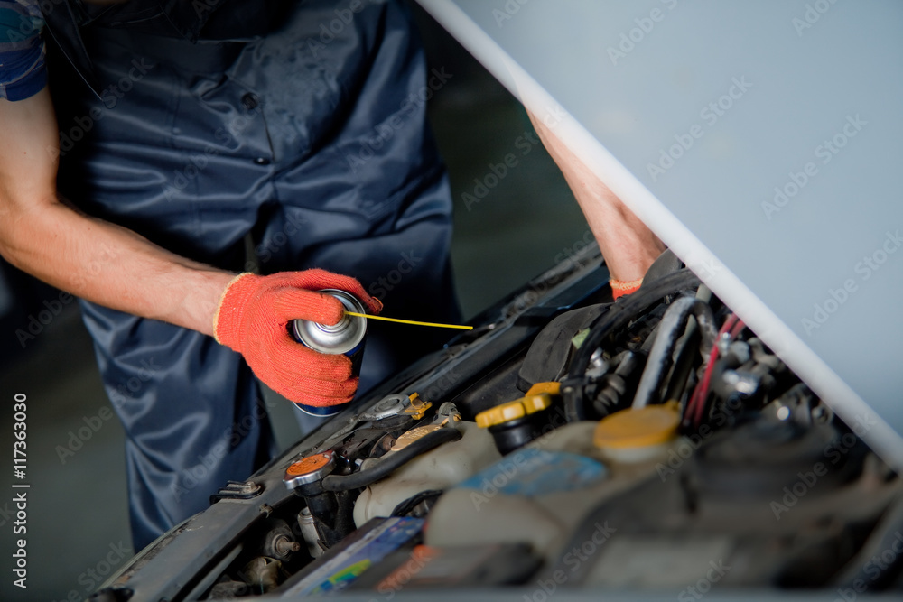 Auto mechanic worker in garage. Auto mechanic worker in garage.
