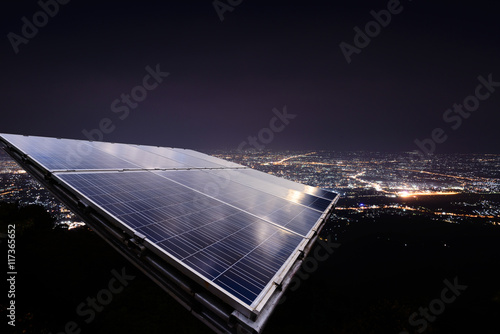 Solar panel with city night light.