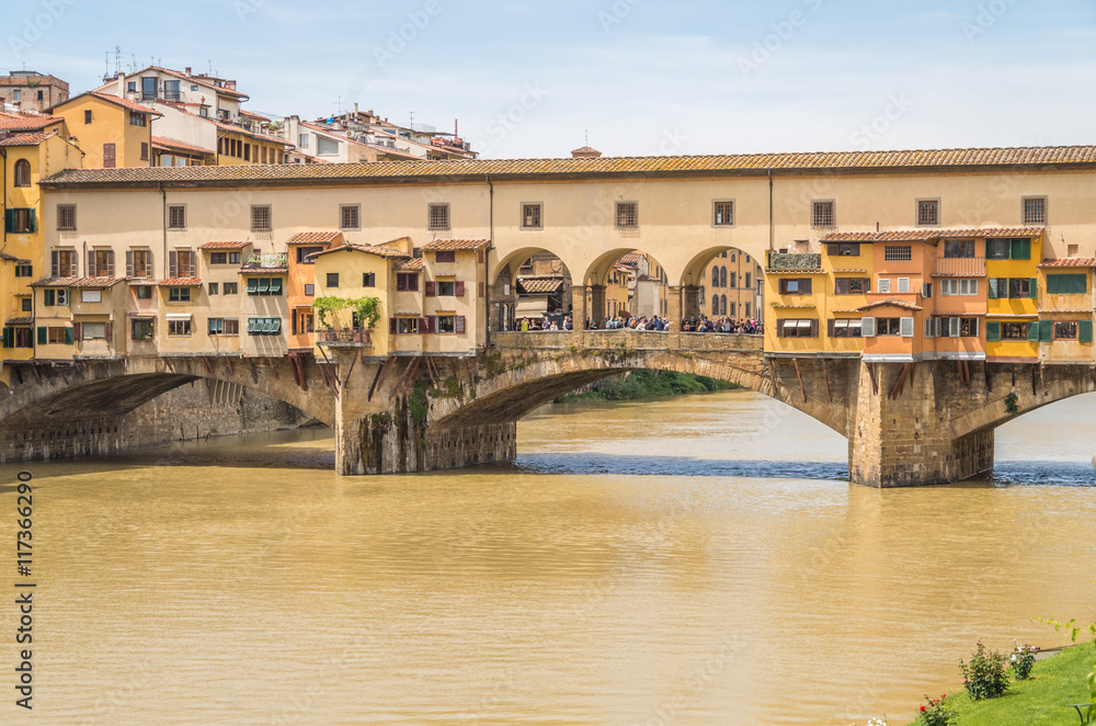 Obraz premium The Ponte Vecchio is a famous and historical bridge over the River Arno