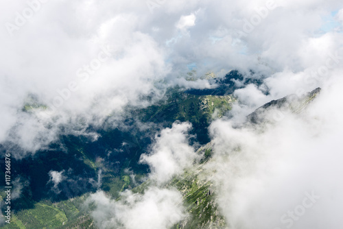 rocky mountain landscape covered with clouds