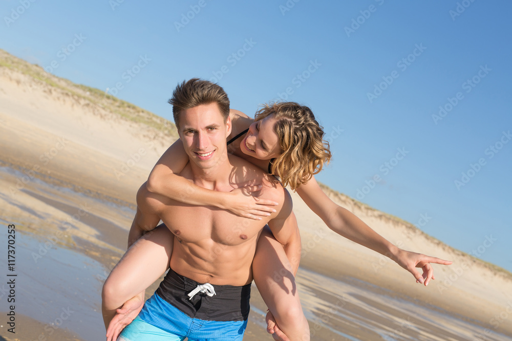 Piggy Back Fun on the beach. Honey Moon Piggy Back Fun on the beach. Honey Moon