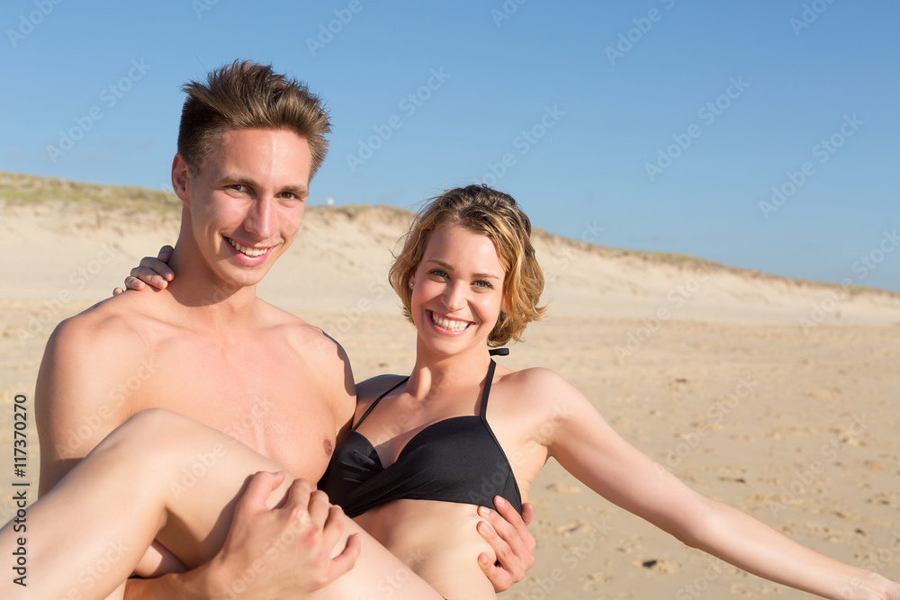 romantic young couple on the beach.Vacation romantic young couple on the beach.Vacation