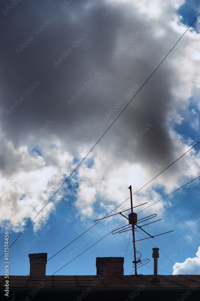 Clouds in the sky over the roof Clouds in the sky over the roof
