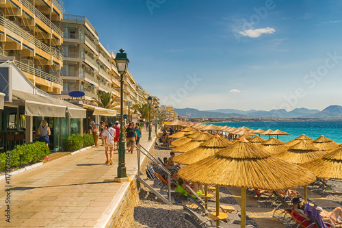 Everyday life at Loutraki in Gteece with people enjoying their summer vacations. photo