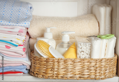 Set of baby hygiene accessories on shelf