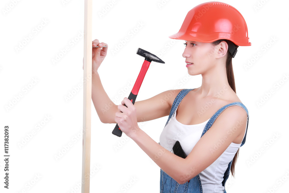 Women shows construction tools, isolated on white background Women shows construction tools, isolated on white background