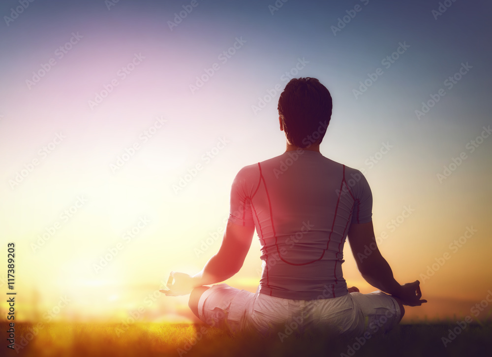 man enjoying meditation and yoga