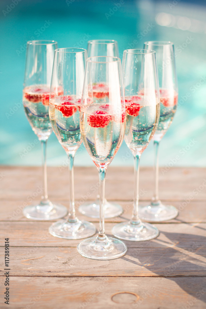 champagne glasses wich raspberry champagne glasses wich raspberry