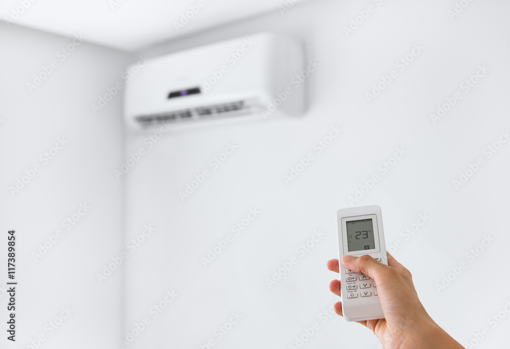 Split air conditioner on a white wall. Split air conditioner on a white wall.