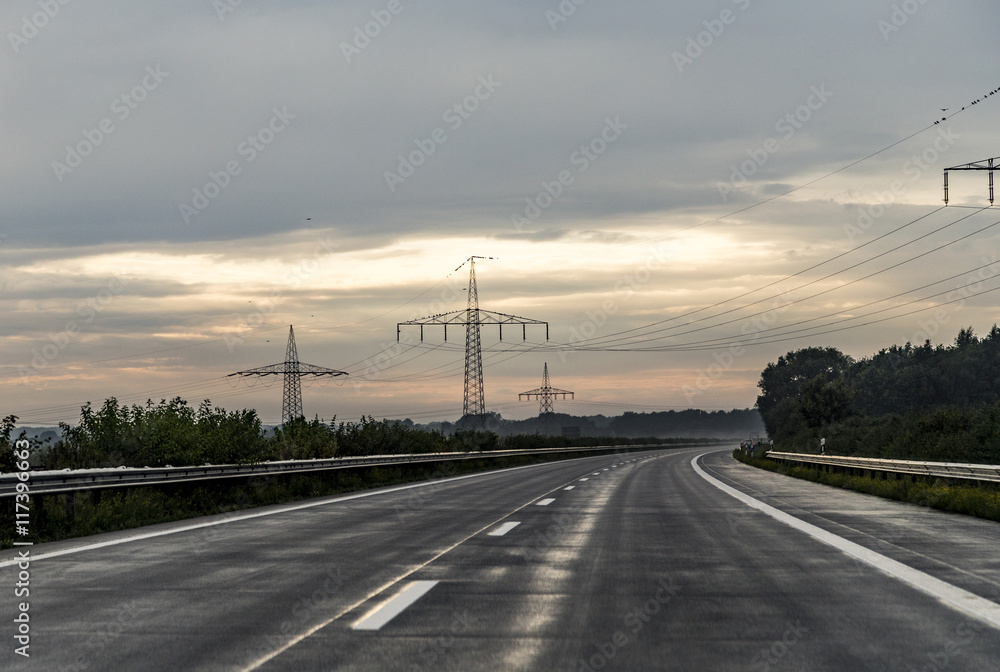 highway a7 in heavy rain seen through windshield