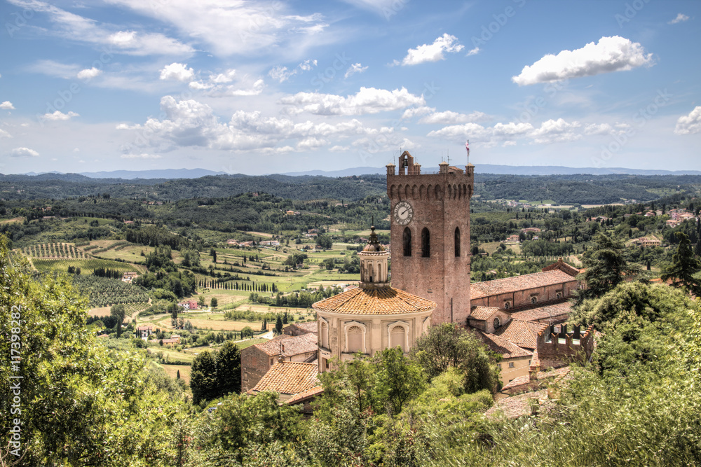 View over the impressive landscape in Tuscany with the cathedral of San Miniato in Italy
