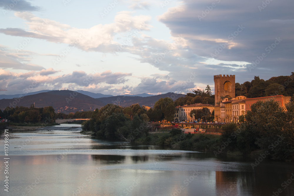 Sunset at a Tuscan landscape with the Arno river near the city of Florence, Italy
Sunset at a Tuscan landscape with the Arno river near the city of Florence, Italy