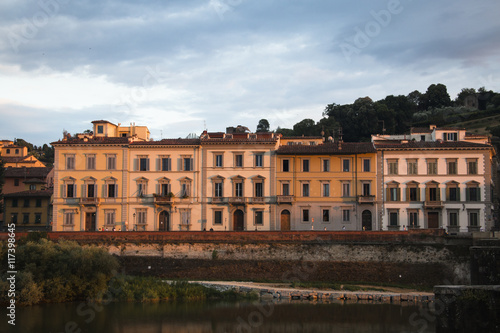 Several historical buildings next to the Arno river near the city of Florence  Italy  