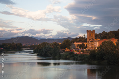 Sunset at a Tuscan landscape with the Arno river near the city of Florence, Italy 