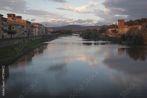 Sunset at a Tuscan landscape with the Arno river near the city of Florence, Italy 