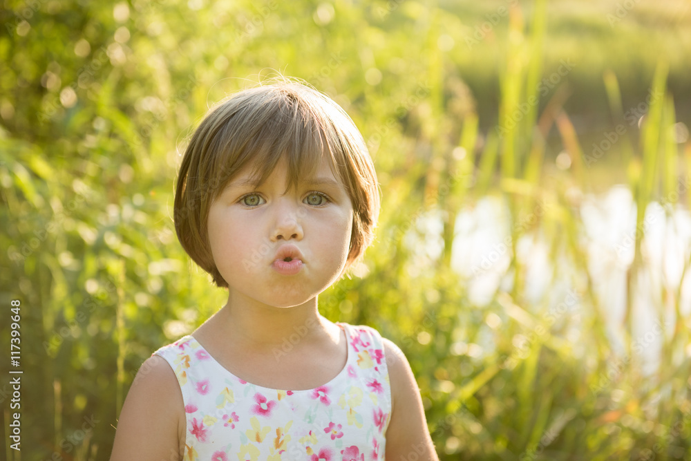 Closeup portrait of pretty cute beautiful girl in park Closeup portrait of pretty cute beautiful girl in park