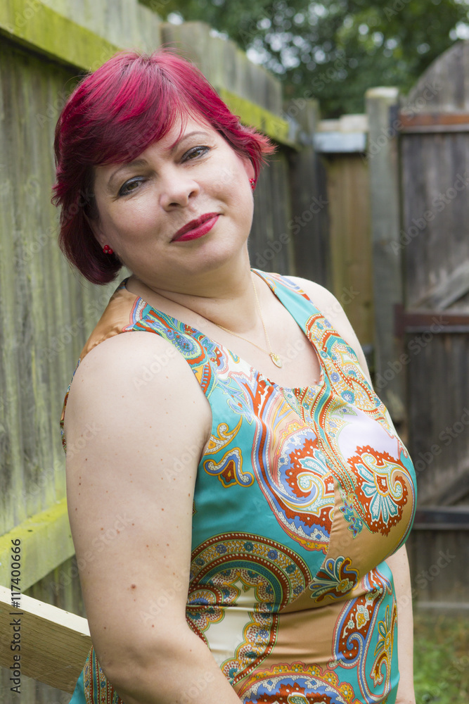 Fototapeta premium Portrait of woman in dress outdoors