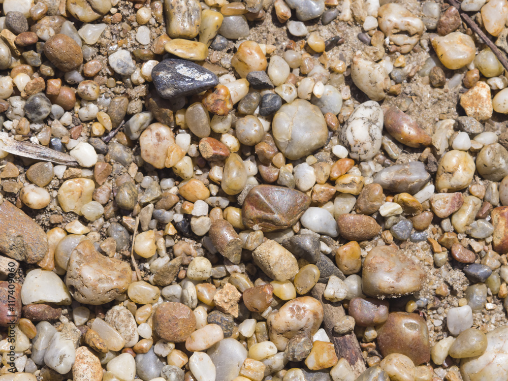 Abstract pebble stones background texture macro, selective focus