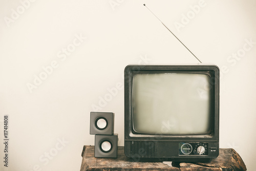 Retro old television on table. Vintage retro style.