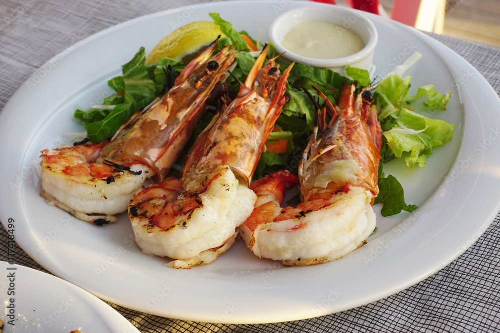 Dish of grilled shrimp with head on