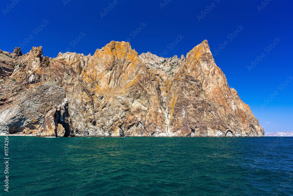 rocky shore sea cliffs in Crimea Karadag