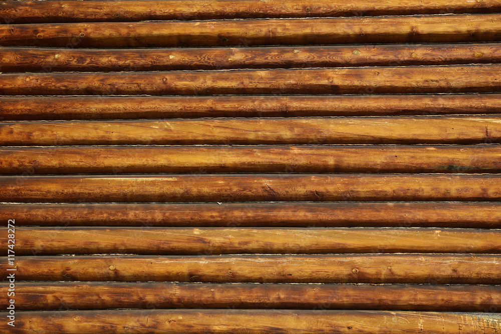 Natural background pattern of a log wall Natural background pattern of a log wall