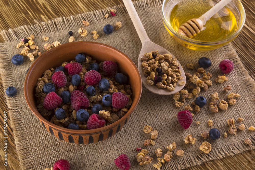 Muesli with fresh berries and honey. Muesli with fresh berries and honey.