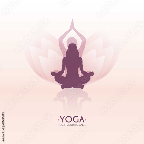 Woman meditating in a lotus yoga position