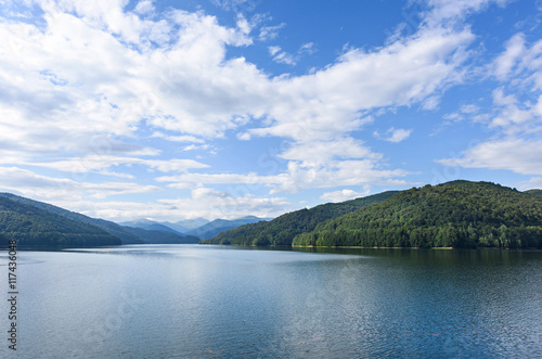 Photo of vidraru lake in fagaras mountains, Romania © frimufilms