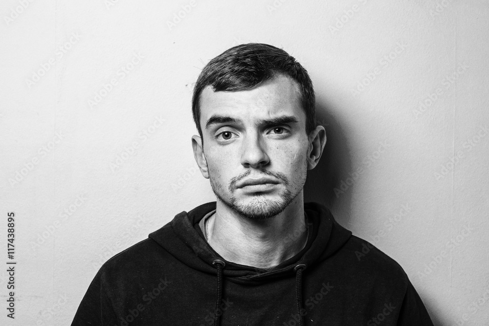 Close up of a funny young man in a jacket with different emotion. The collage of young man in a jacket with different emotion. emotional card. black and white photo. Close up of a funny young man in a jacket with different emotion. The collage of young man in a jacket with different emotion. emotional card. black and white photo.
