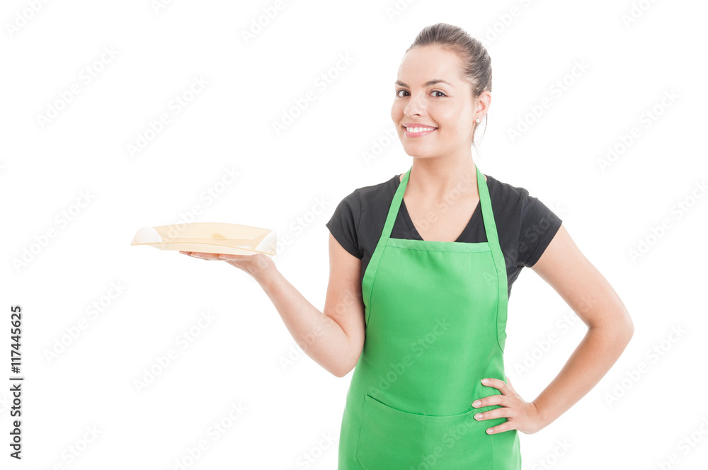 Beautiful young seller serving something on plate Beautiful young seller serving something on plate