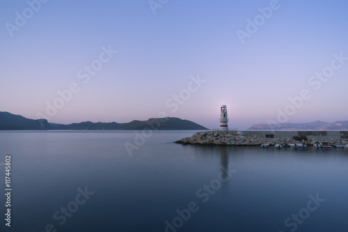 Lighthouse of Kas,, Resort in Turkey. In the background the Greek Island of Kastelorizo 
