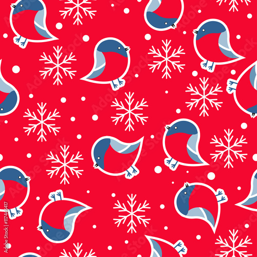 Seamless pattern. New Year's background with the image of bullfinches.